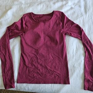 Small womensLululemon long sleeve athletic top with bra insert. Like new.